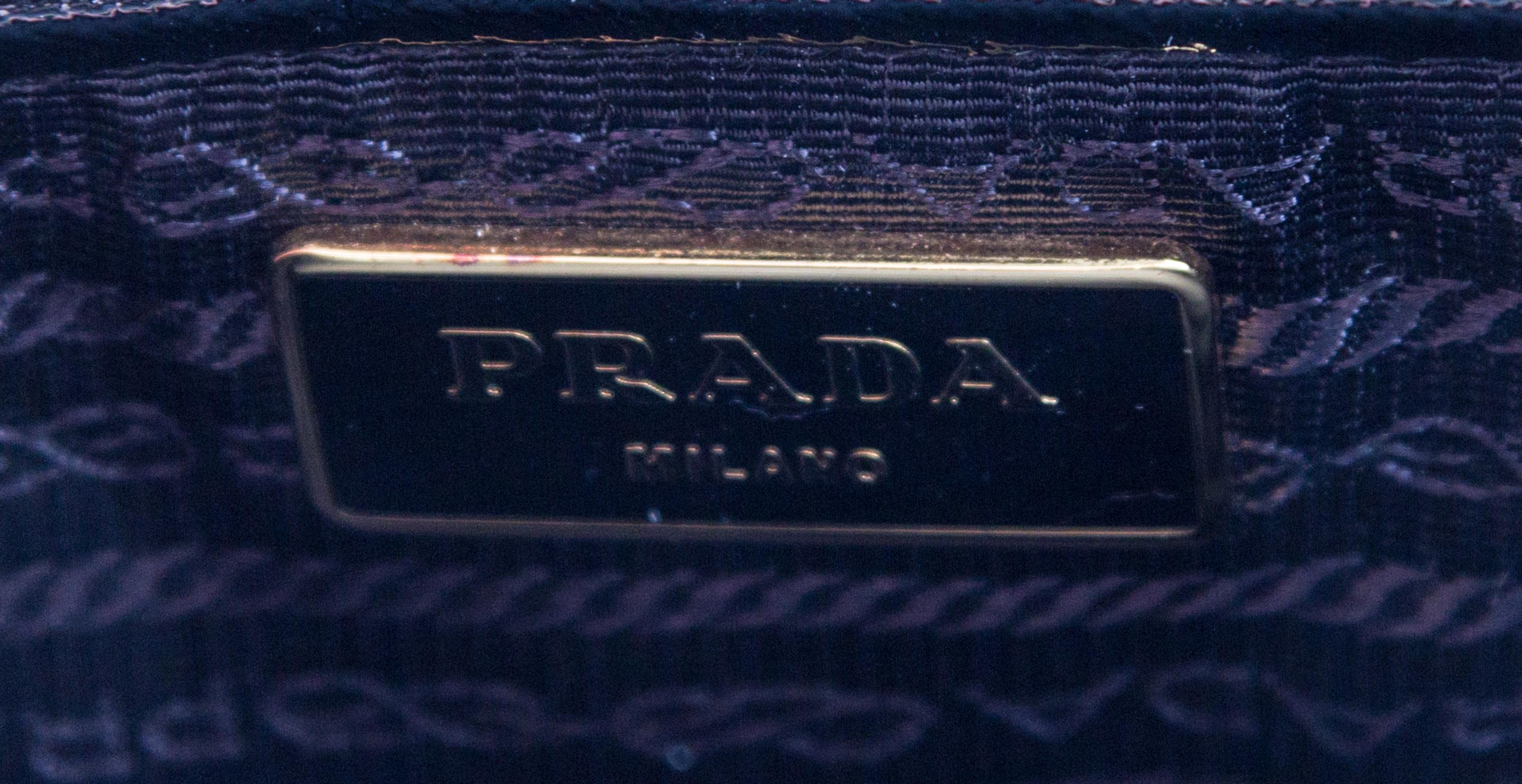 A Prada Black Saffiano Lux Tote Bag, 14" x 10"x 5".