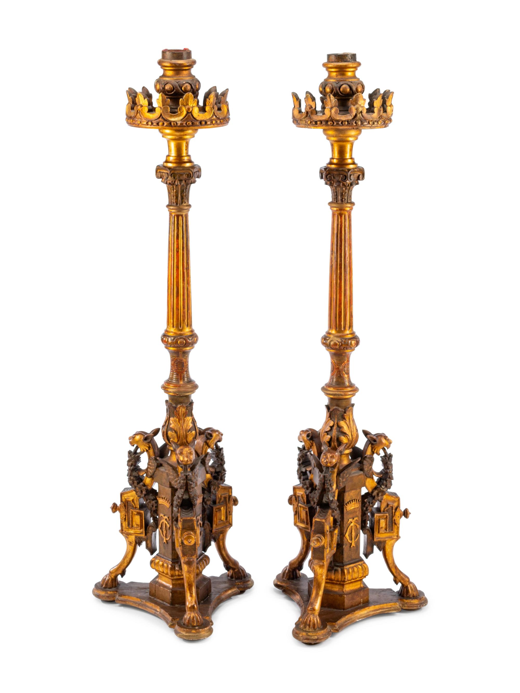 A Pair of Renaissance Revival Giltwood Torchères