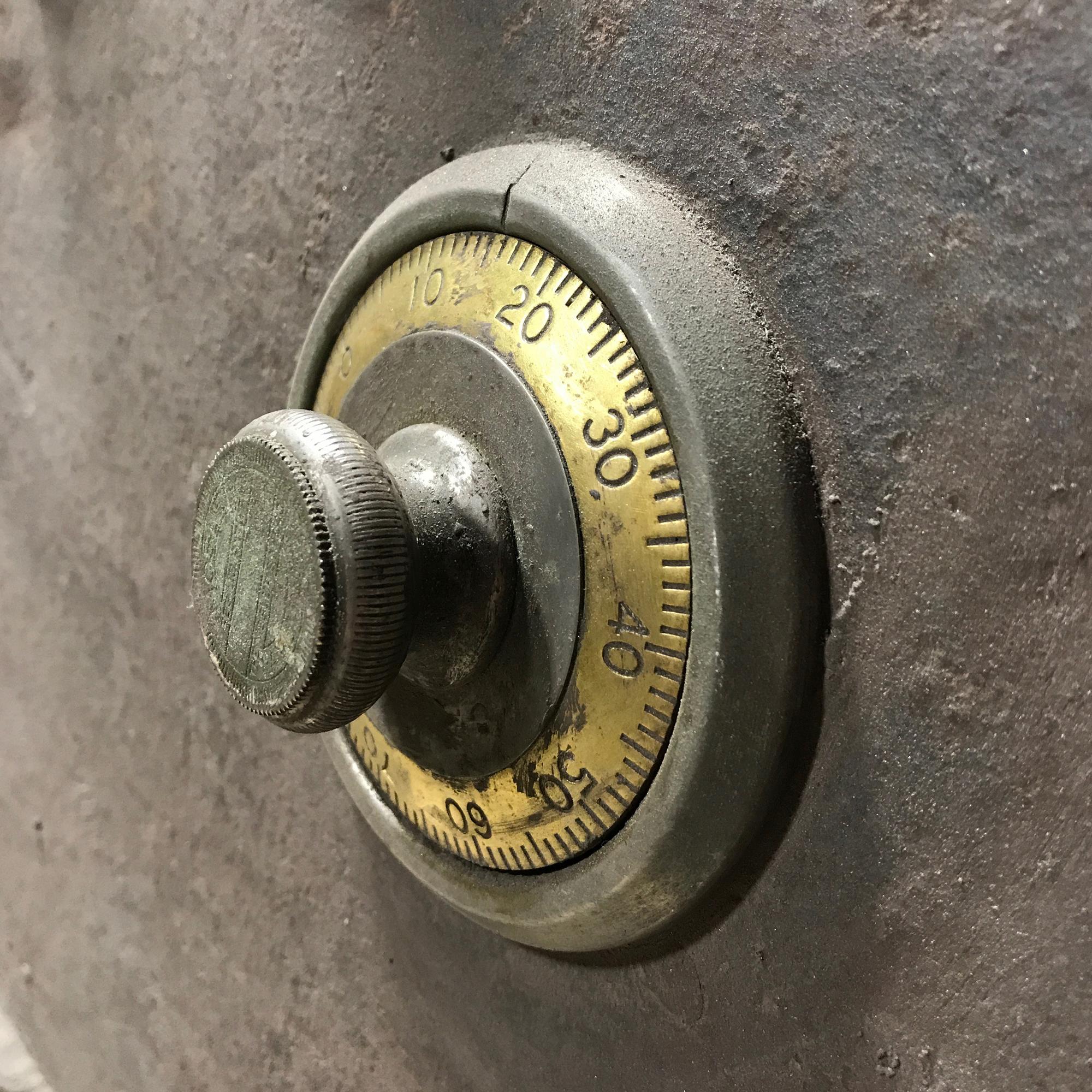 A Cast Iron Safe Door with Frame and Combination 36" W x 4" D x 84" H — United States, 20th Century