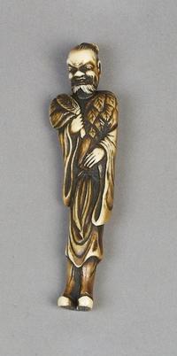 An Ivory Netsuke of a Man, Height 3 7/8 inches.