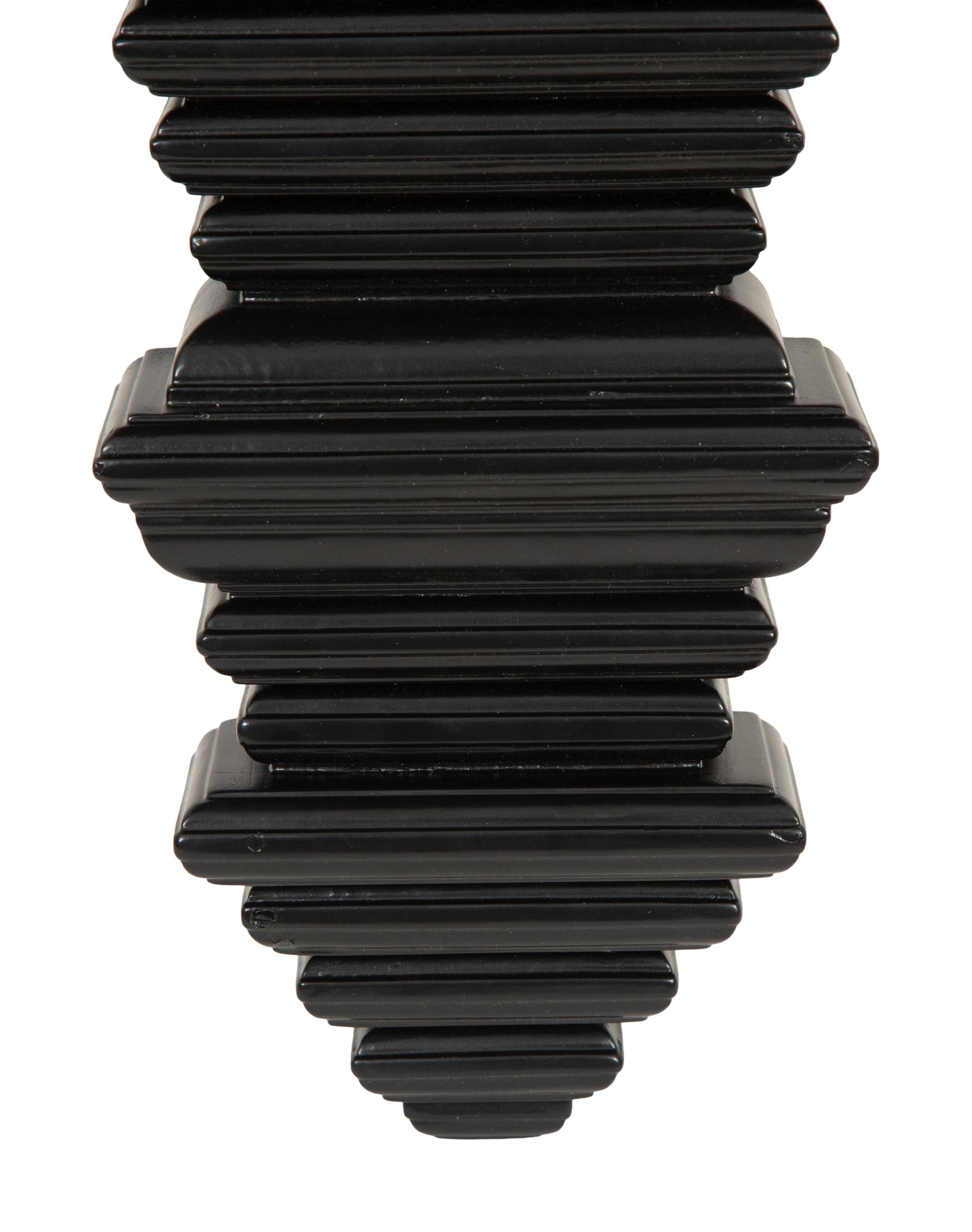 A Pair of Ebonized Wall Brackets