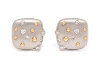 A Pair of Platinum, 18 Karat Yellow Gold and Diamond Earclips,