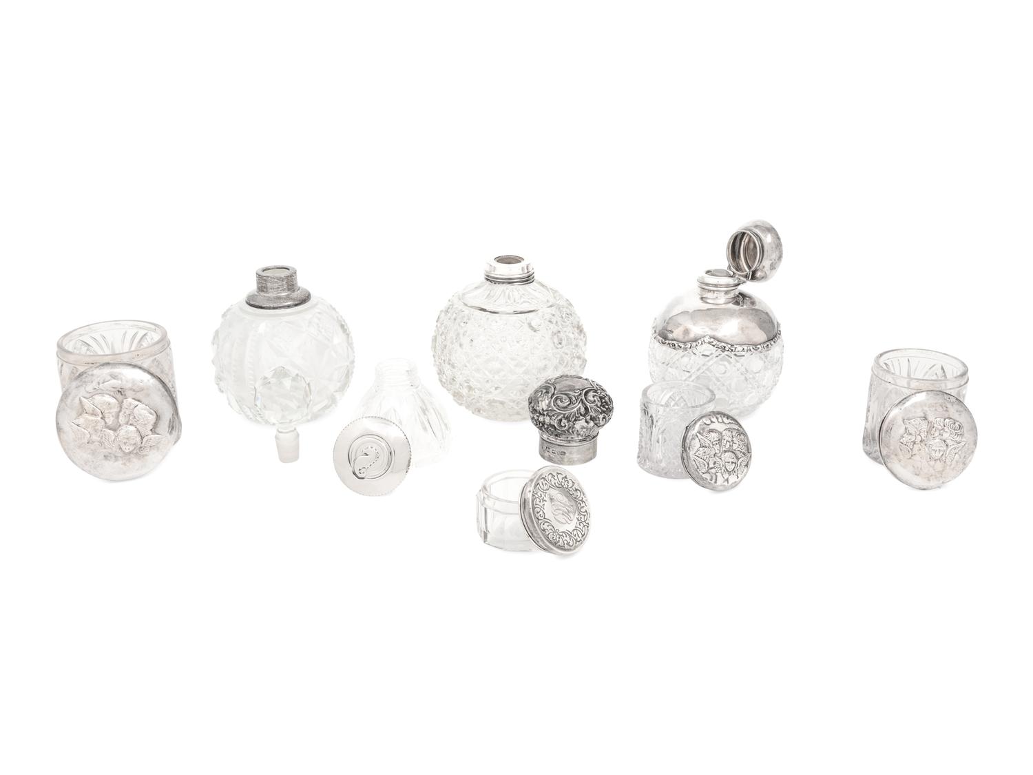 A Collection of Eight Silver Mounted Jars