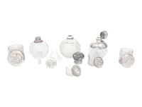 A Collection of Eight Silver Mounted Jars