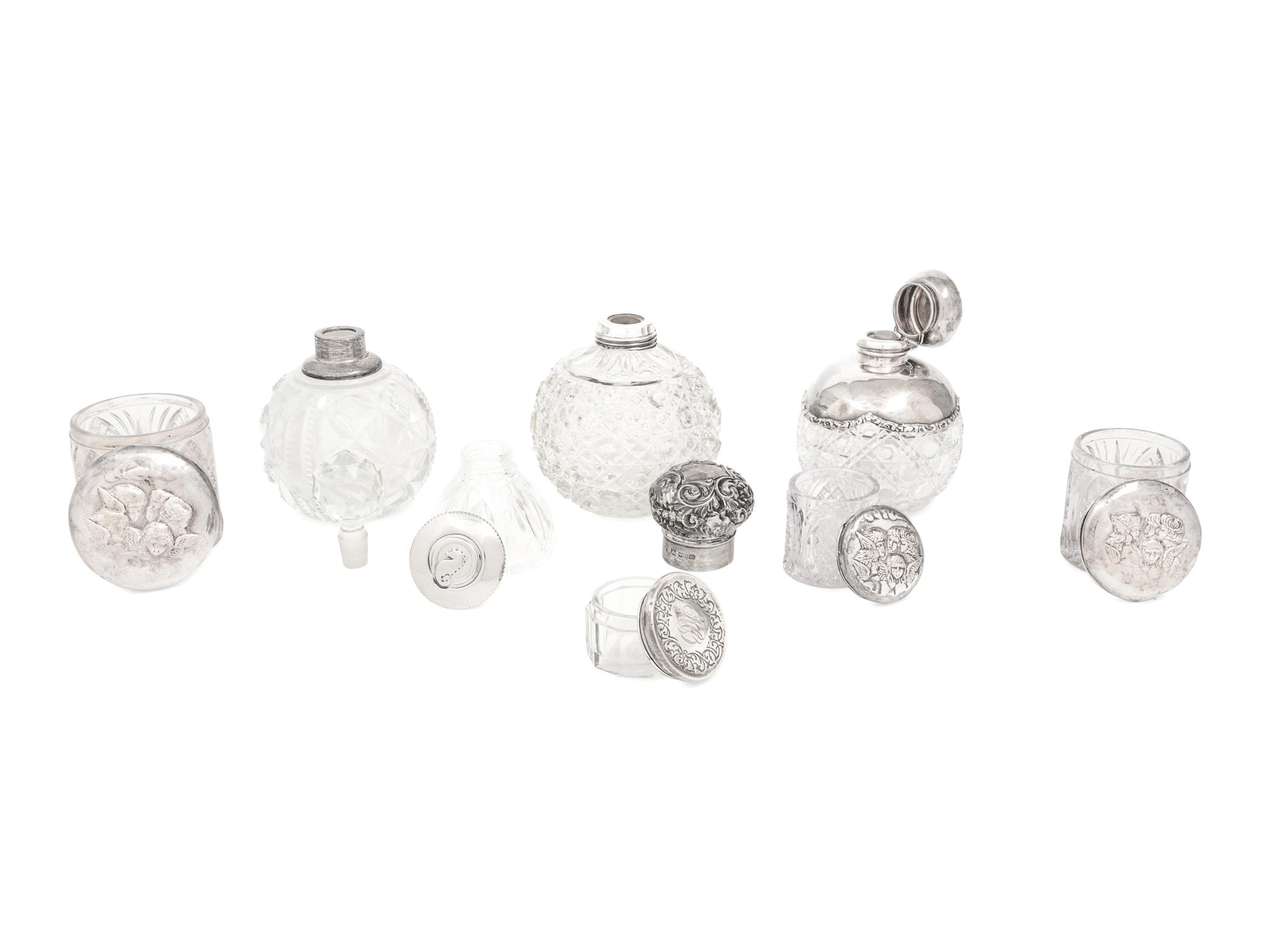 A Collection of Eight Silver Mounted Jars