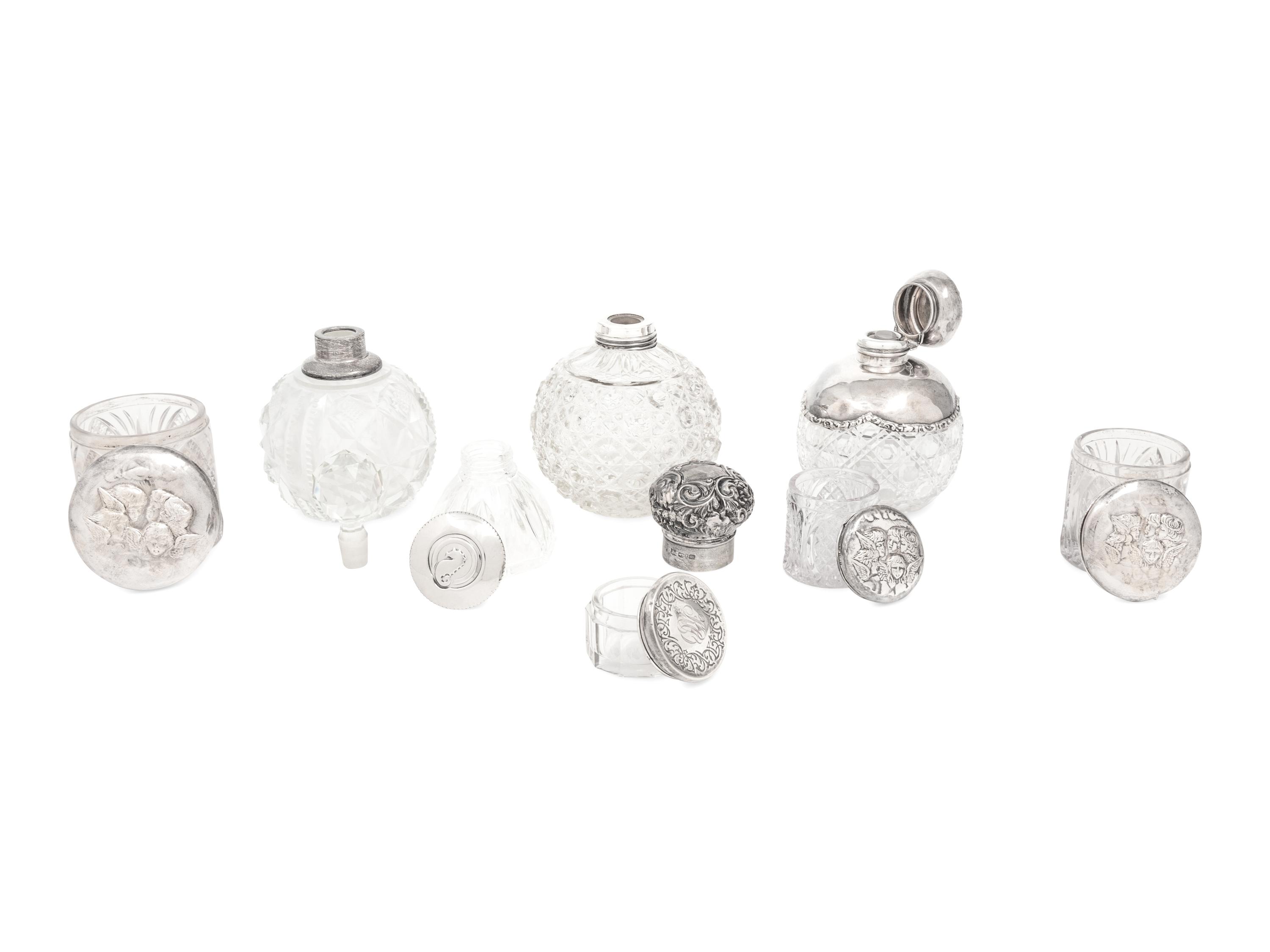 A Collection of Eight Silver Mounted Jars