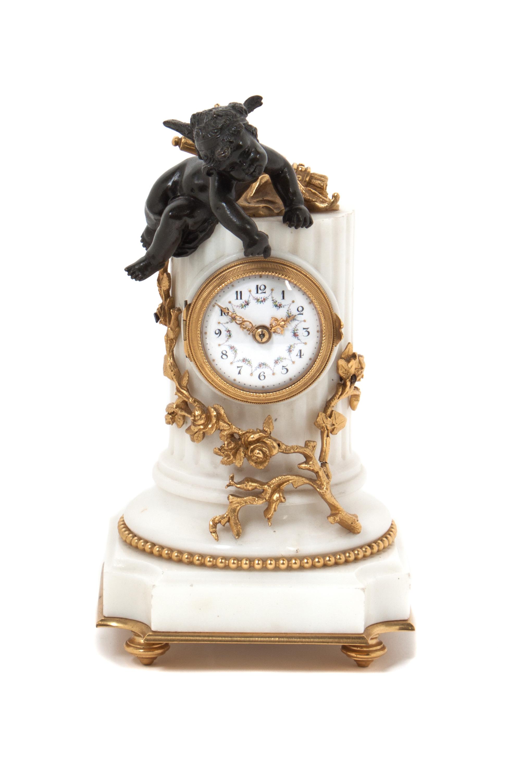 A French Gilt and Patinated Bronze Mantle Clock Height 8 inches. — 19TH/20TH CENTURY