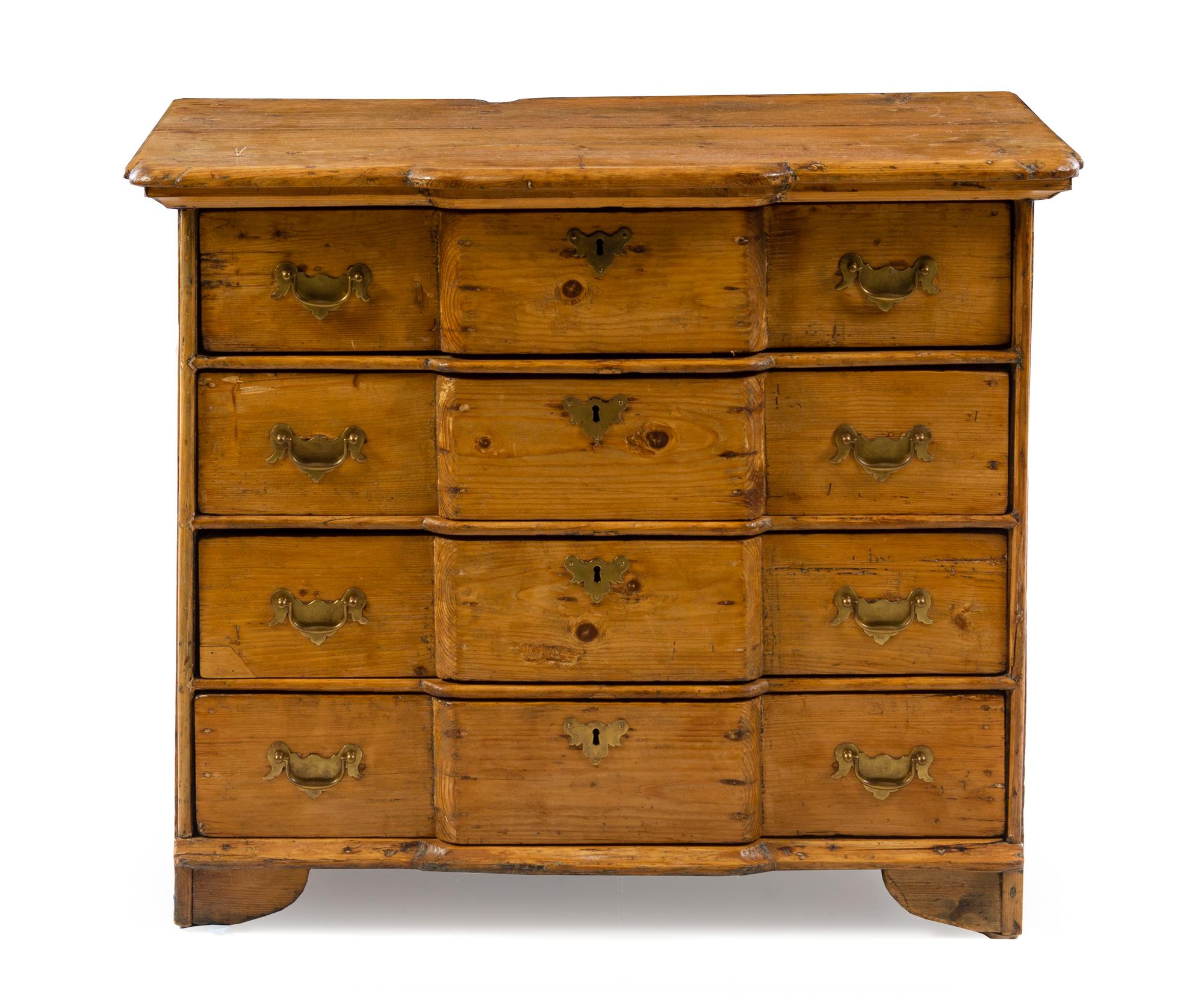 A Chippendale Style Pine Chest of Drawers Height 30 x width 36 1/4 x depth 21 1/2 inches. — 20TH CENTURY WITH EARLIER ELEMENTS