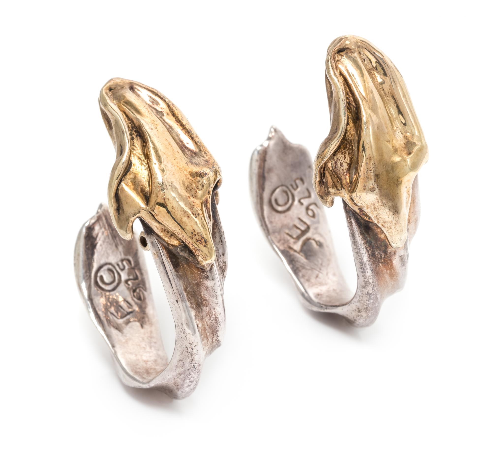 A Pair of Sterling Silver and Yellow Gold Ear Clips, 12.40 dwts.