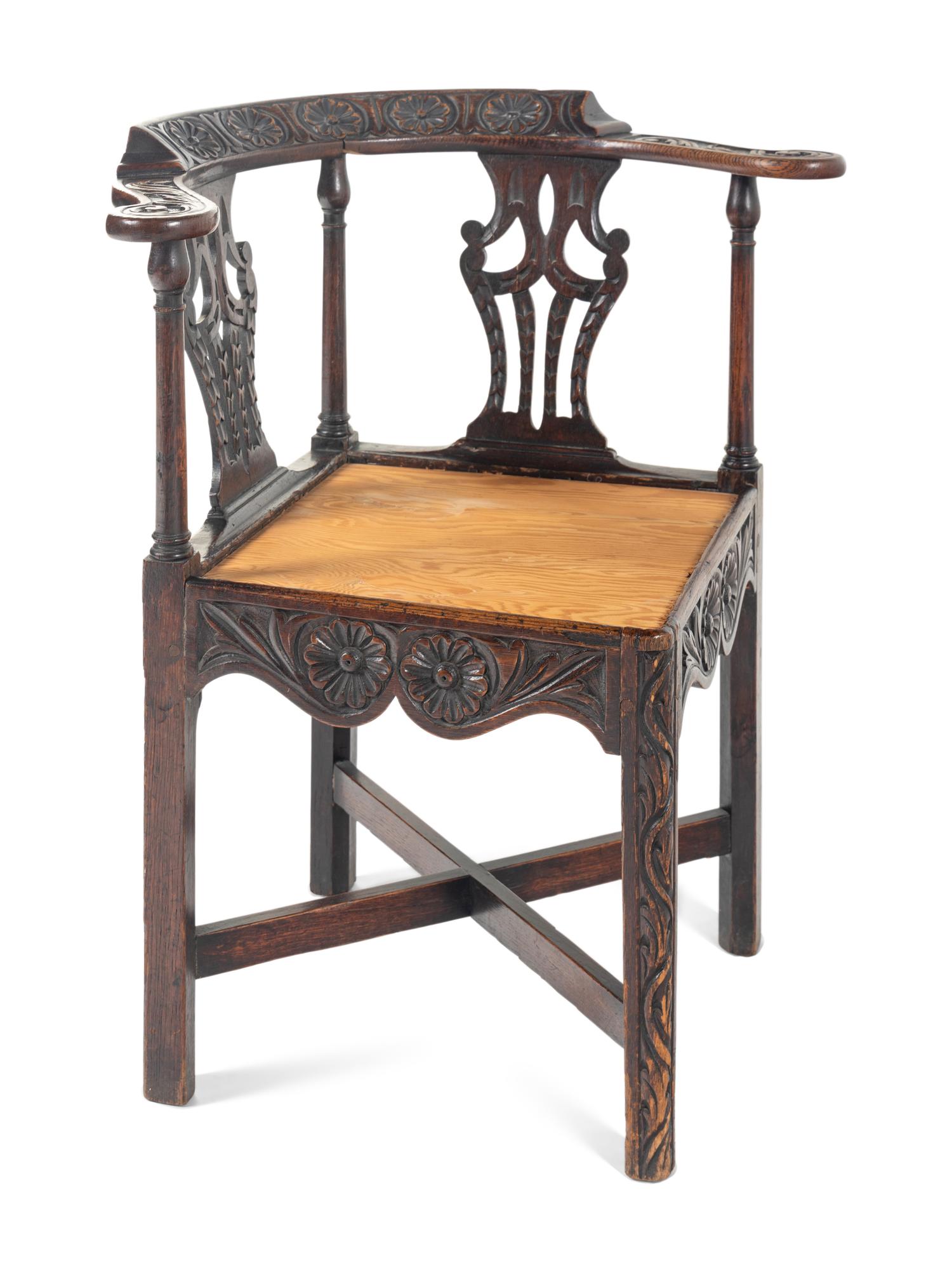 A William and Mary Carved Oak Corner Chair