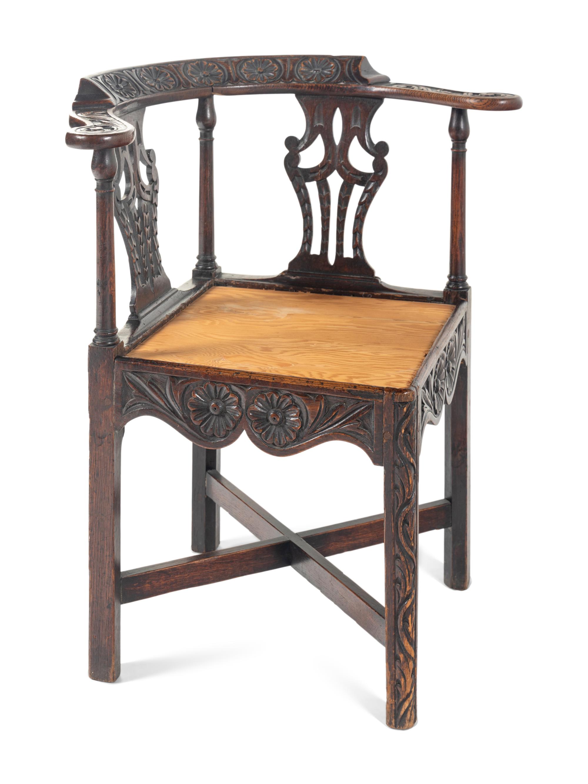 A William and Mary Carved Oak Corner Chair