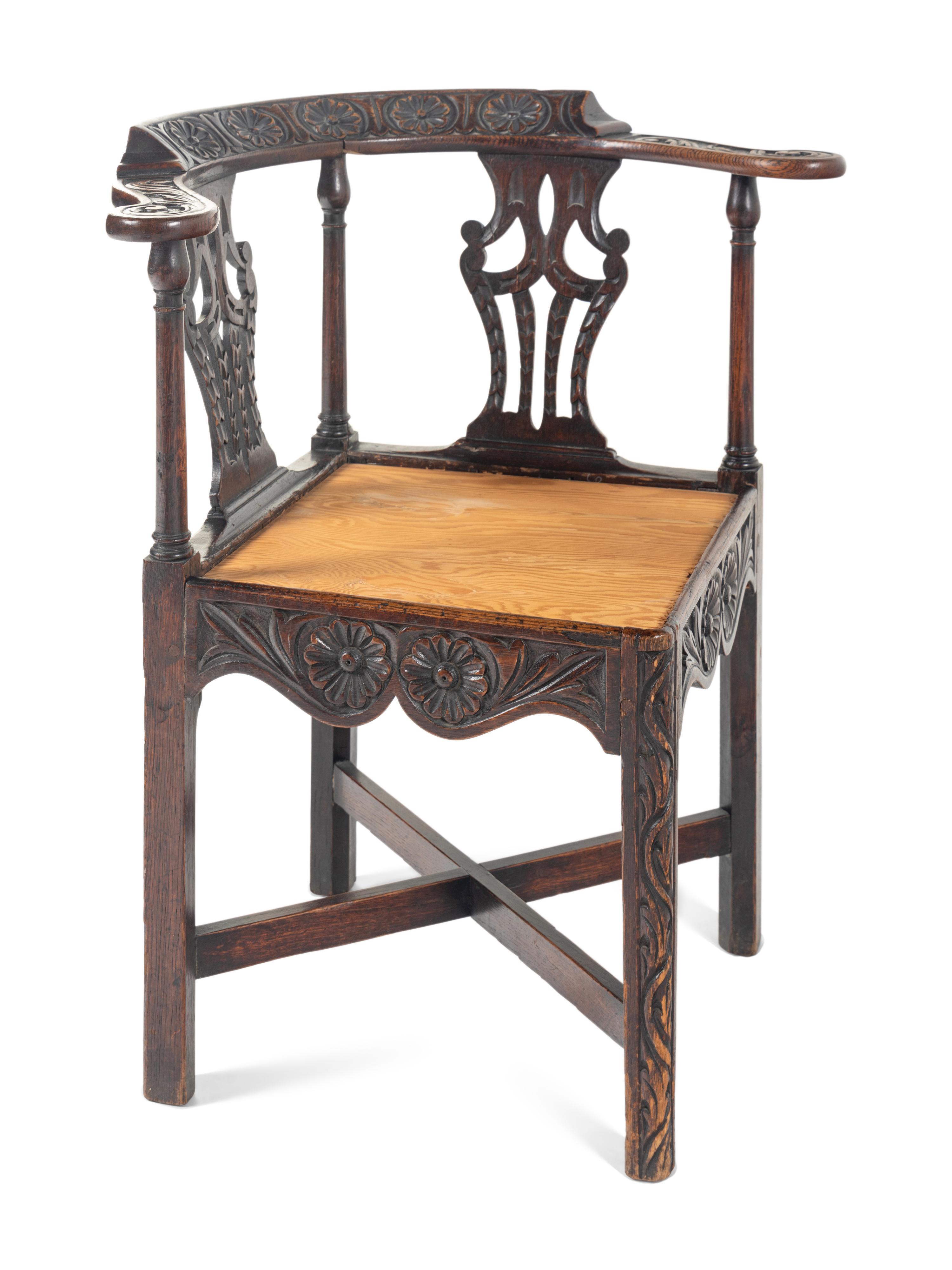 A William and Mary Carved Oak Corner Chair