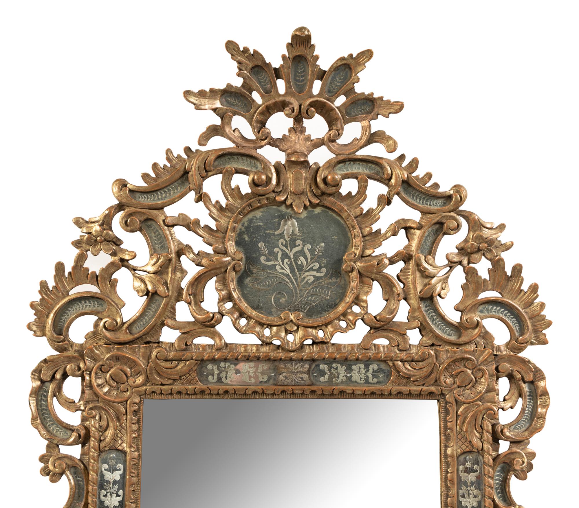 A Continental Giltwood and Etched Glass Mirror