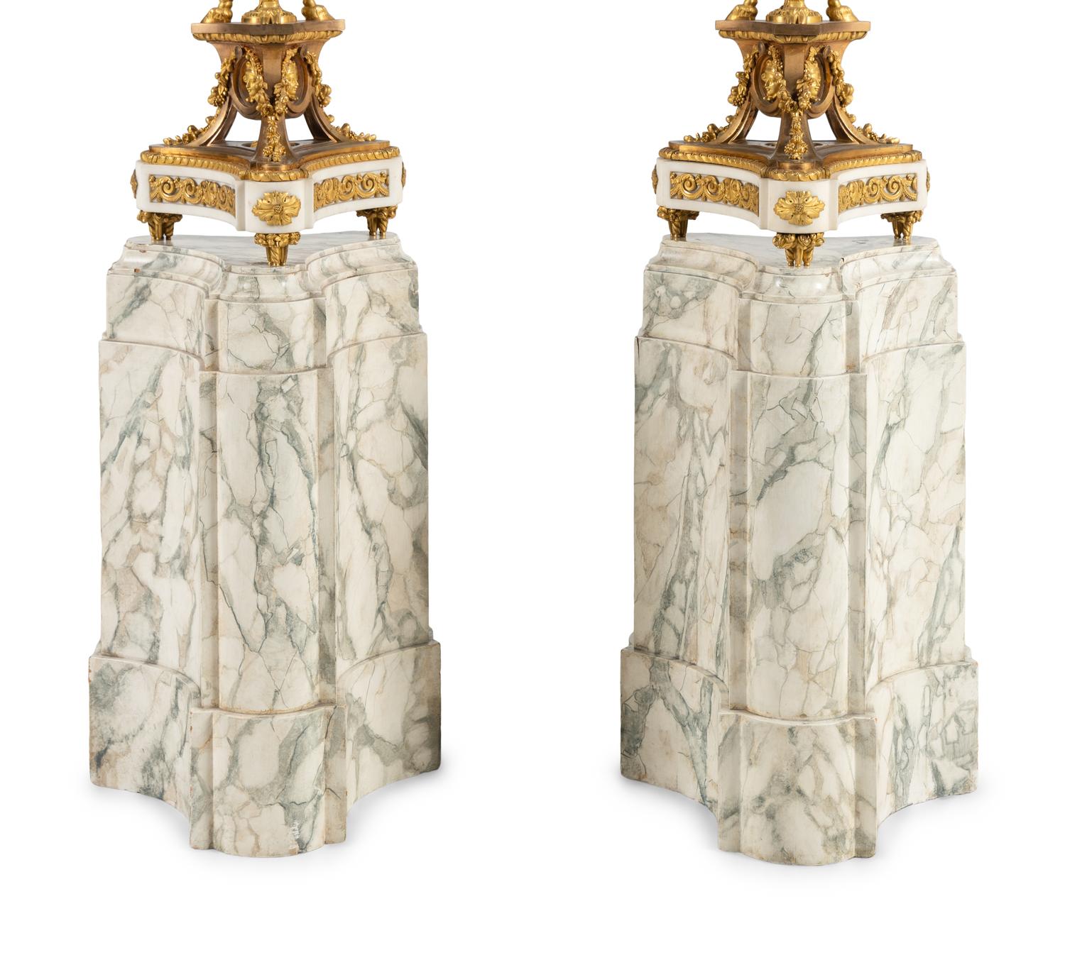 A Pair of Louis XVI Style Gilt Bronze and White Marble Ten-Light Candelabra