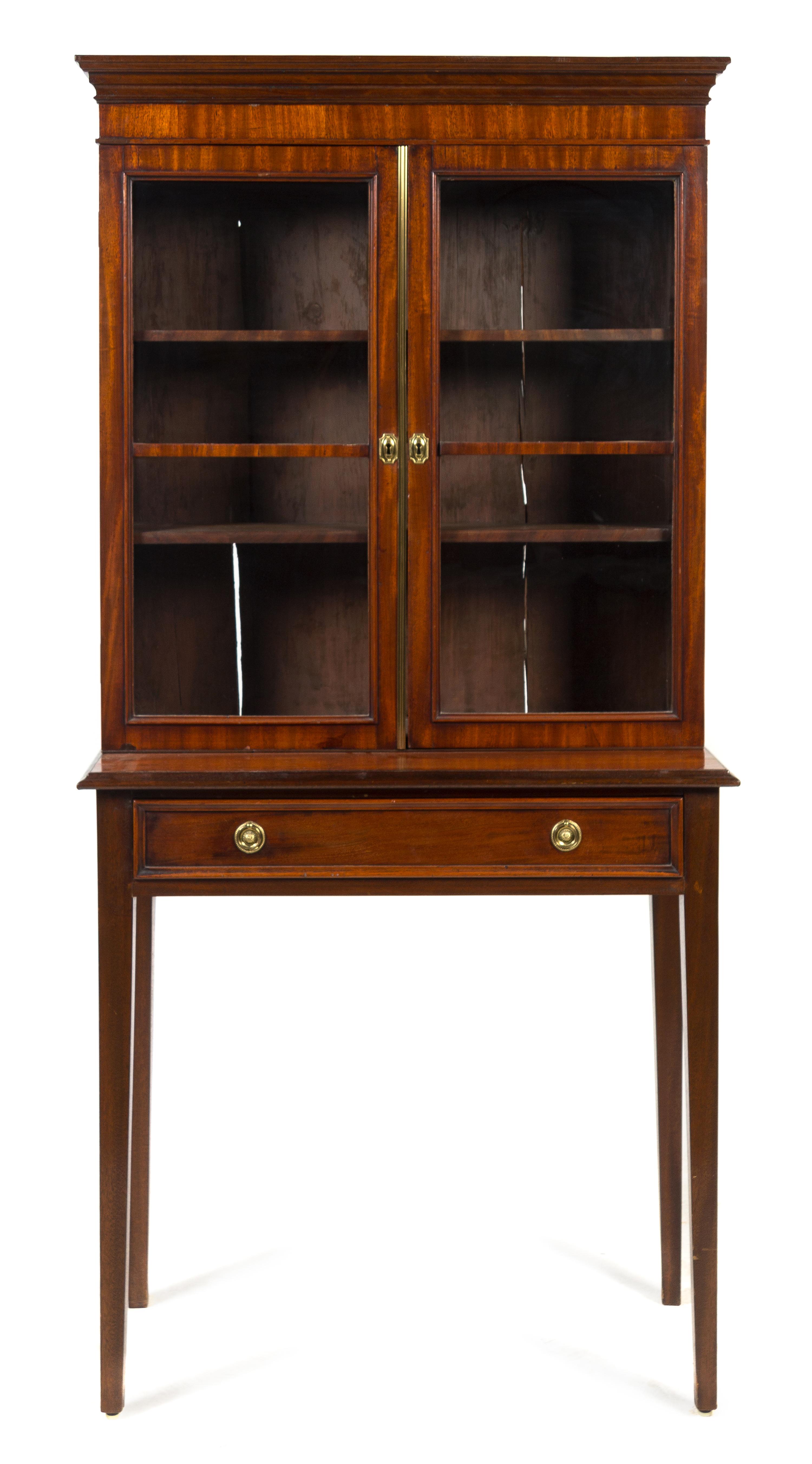 A Regency Mahogany Cabinet on Stand Height 64 1/2 x width 32 x depth 14 3/4 inches. — 19TH CENTURY