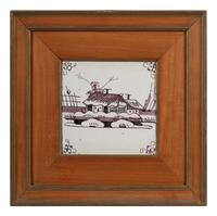 A Set of Five Framed Puce Delft Tiles