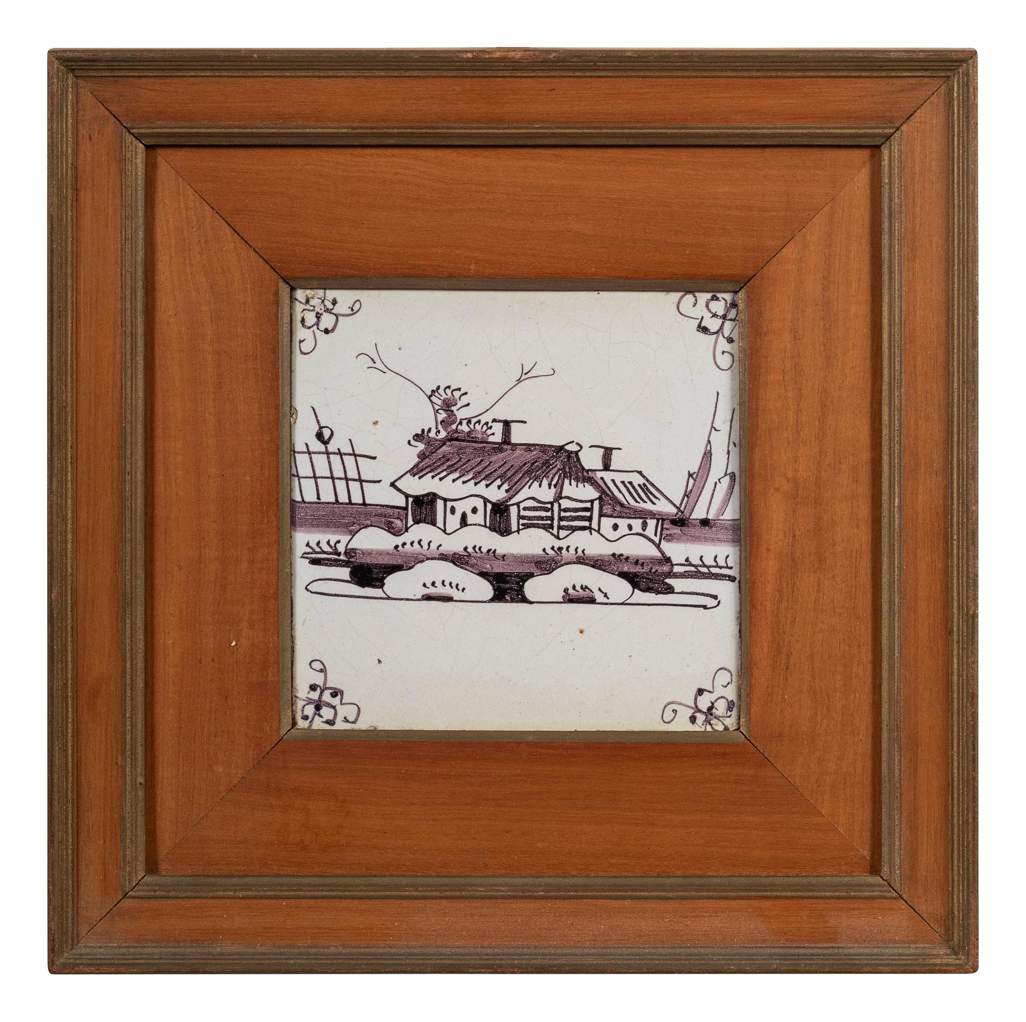 A Set of Five Framed Puce Delft Tiles