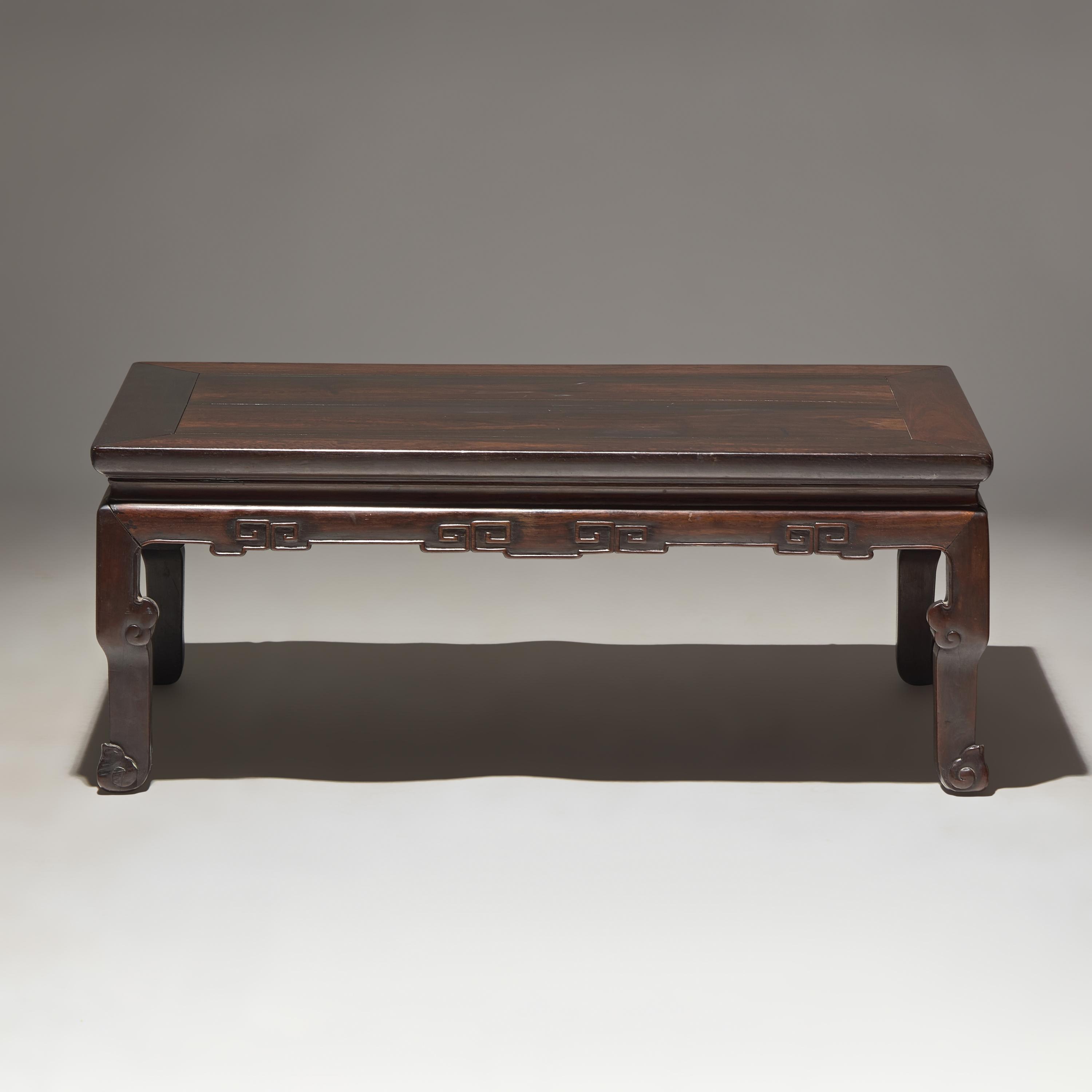 A Chinese Zitan and Mixed Hardwoods Kang Table, 19th/ Early 20th Century — 晚清/民國 紫檀拼硬木炕桌