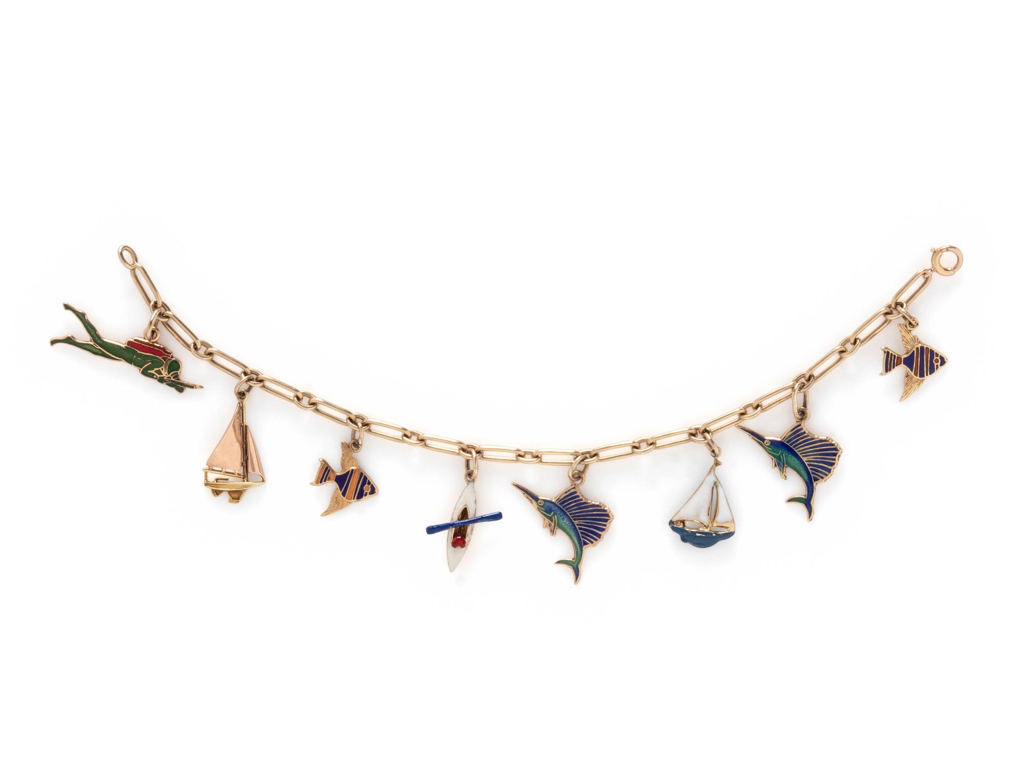 YELLOW GOLD AND ENAMEL CHARM BRACELET