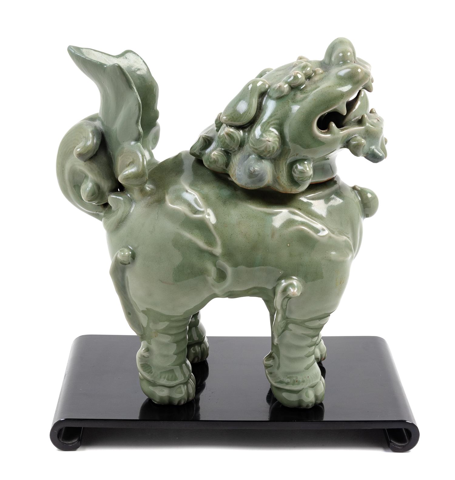 A Celadon Glazed Porcelain Pixiu- Form Incense Burner Height 12 inches.