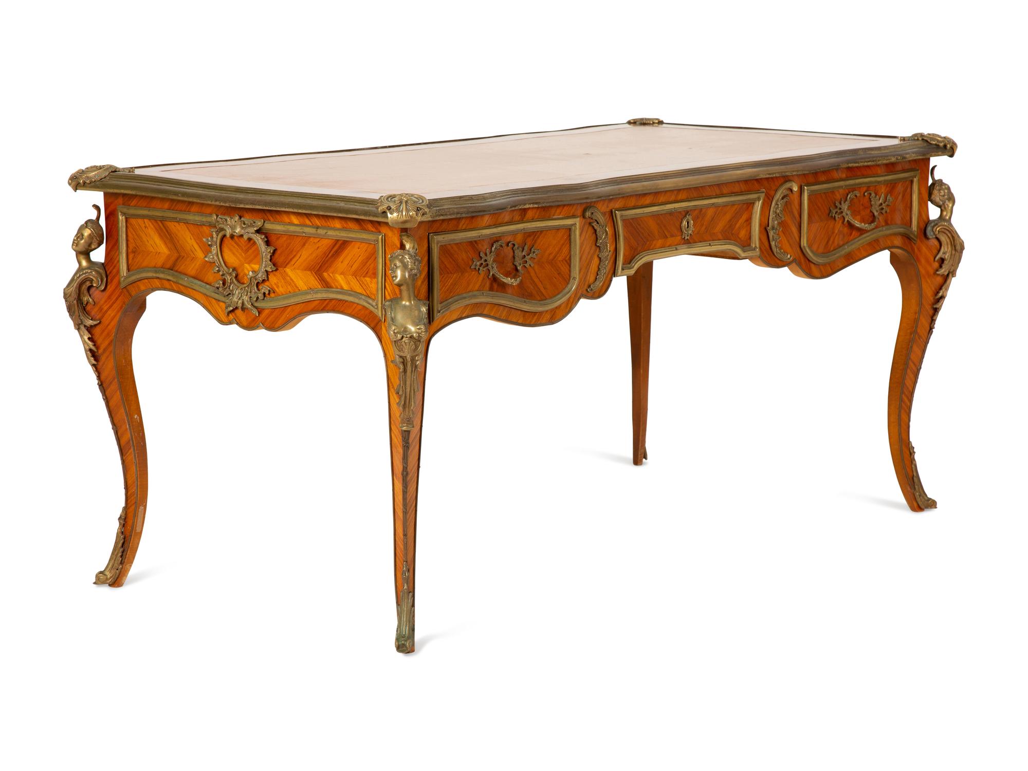 A Louis XV Style Gilt Bronze Mounted Tulipwood Bureau Plat