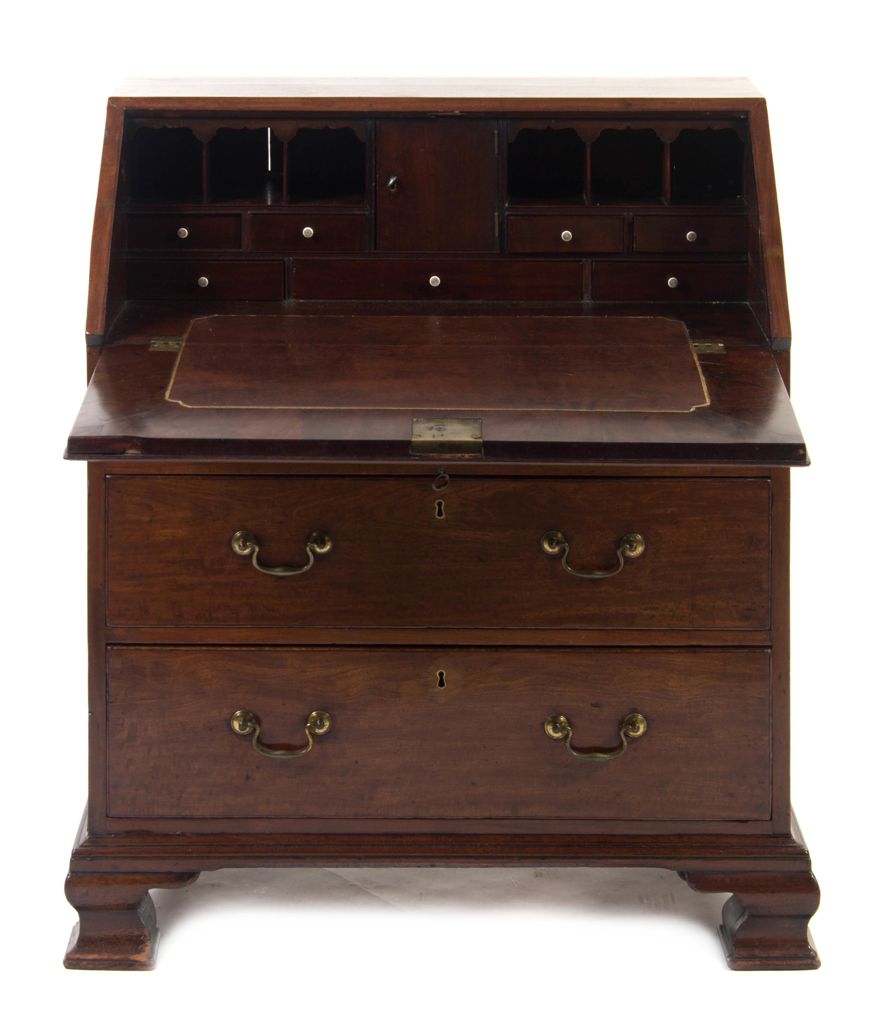 A George III Mahogany Slant Front Bureau, LATE 18TH CENTURY, Height 37 3/4 x width 32 1/2 x depth 18 1/4 inches. — LATE 18TH CENTURY,