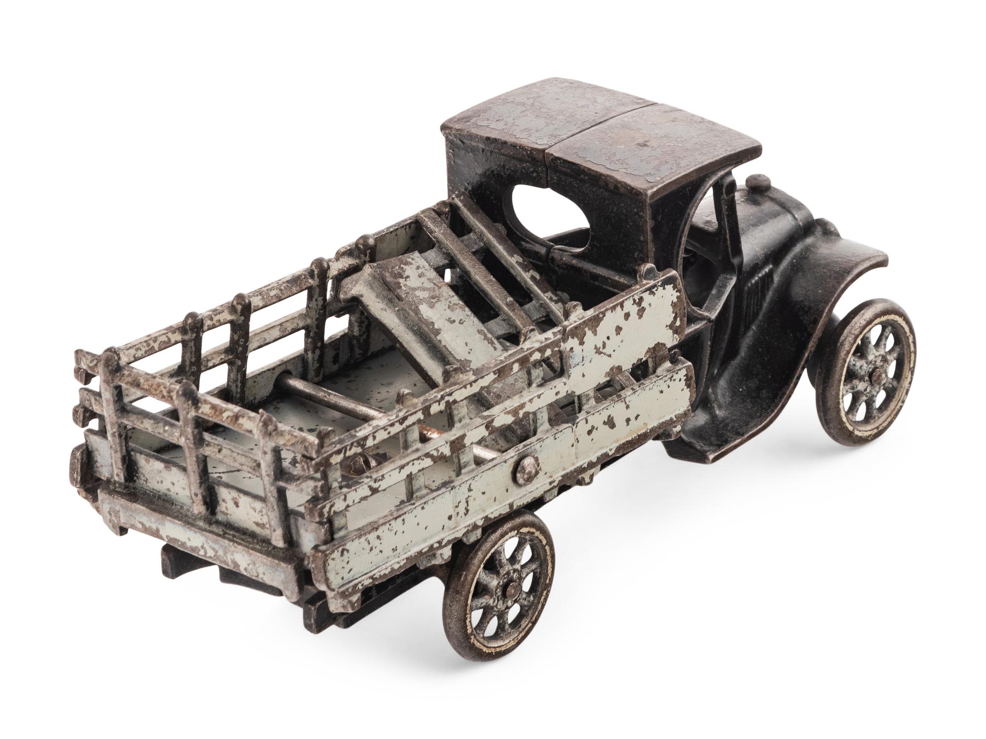Two Arcade Cast Iron Flat Bed Trucks