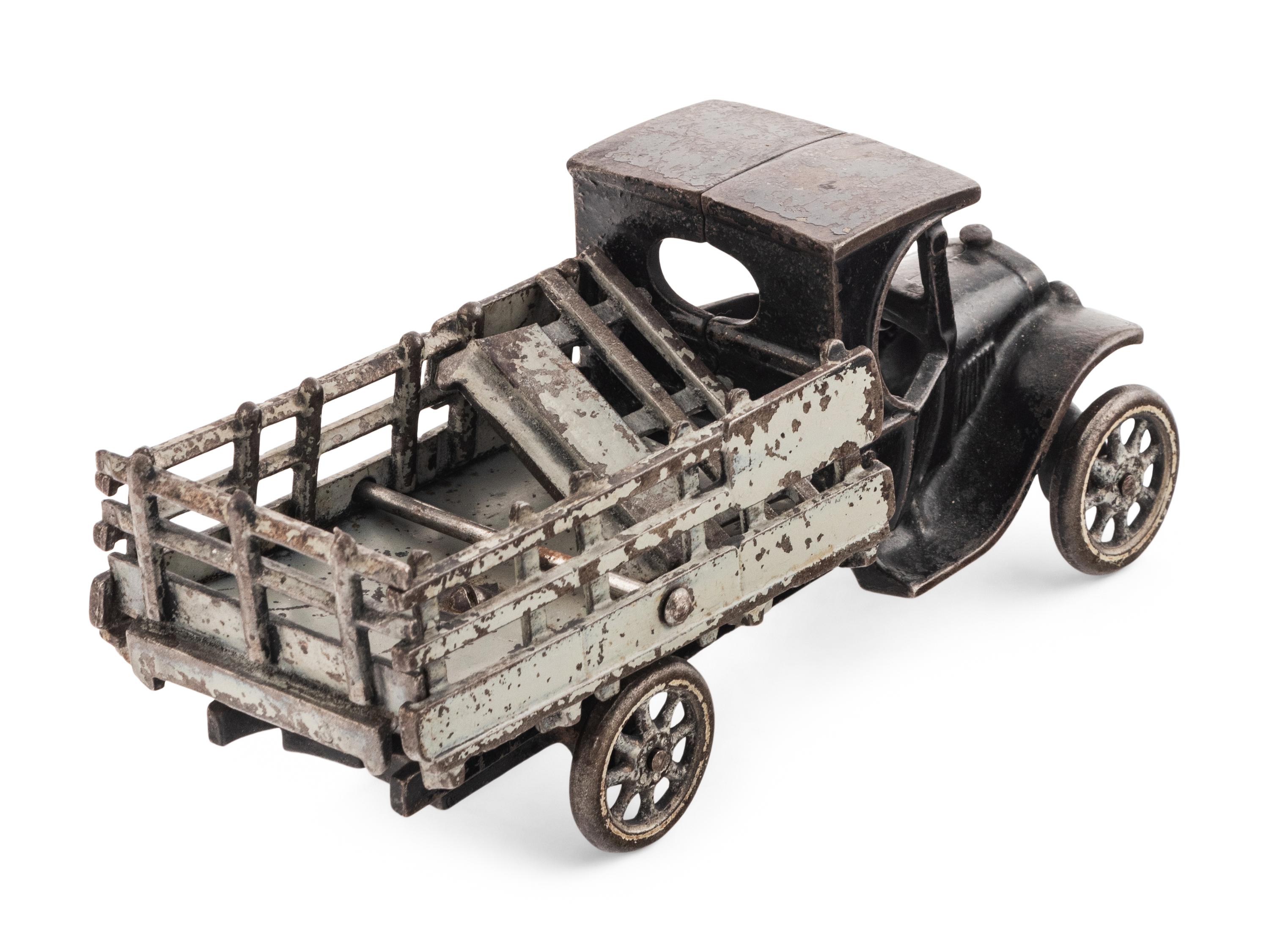 Two Arcade Cast Iron Flat Bed Trucks