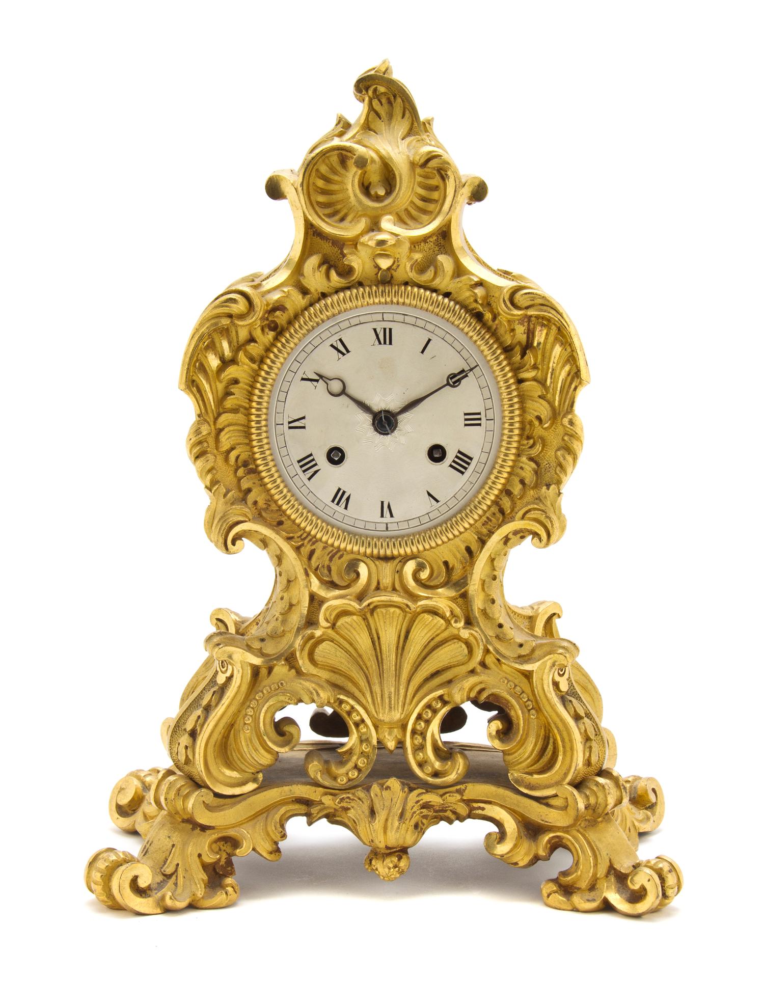 A Louis XV Style Gilt Bronze Mantel Clock, Height 13 1/4 inches.