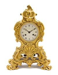 A Louis XV Style Gilt Bronze Mantel Clock, Height 13 1/4 inches.