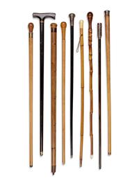 Nine English and Continental Tool System Walking Sticks