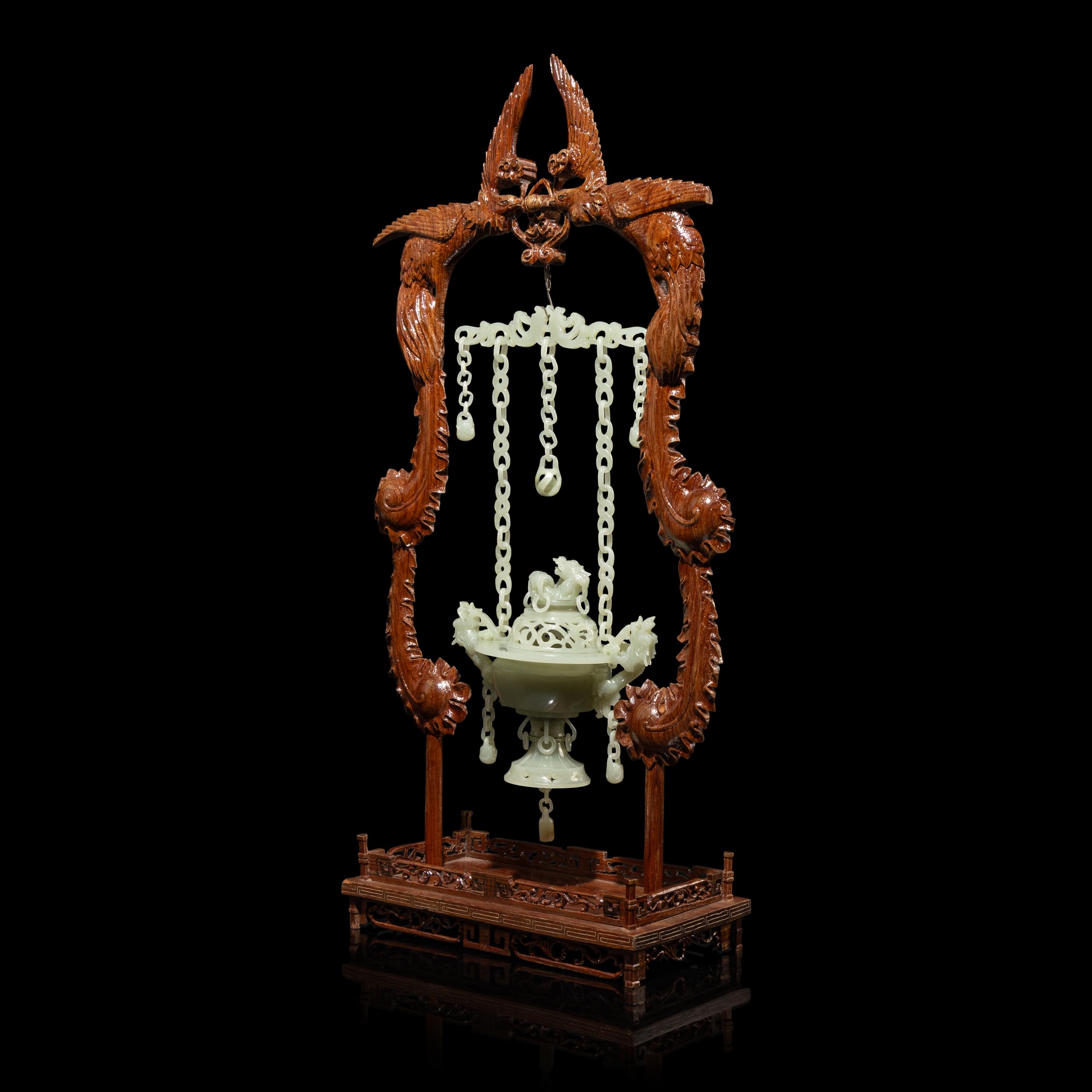 A Chinese Celadon Jade Hanging Incense Burner, 20th Century — 近代 青玉鏈式爐