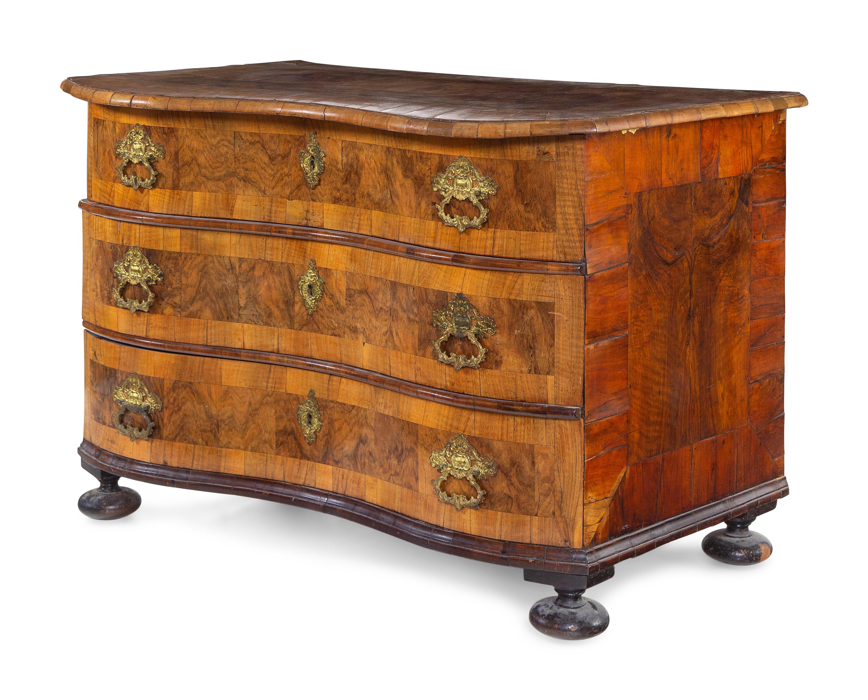 A Continental Burl Walnut Chest of Drawers