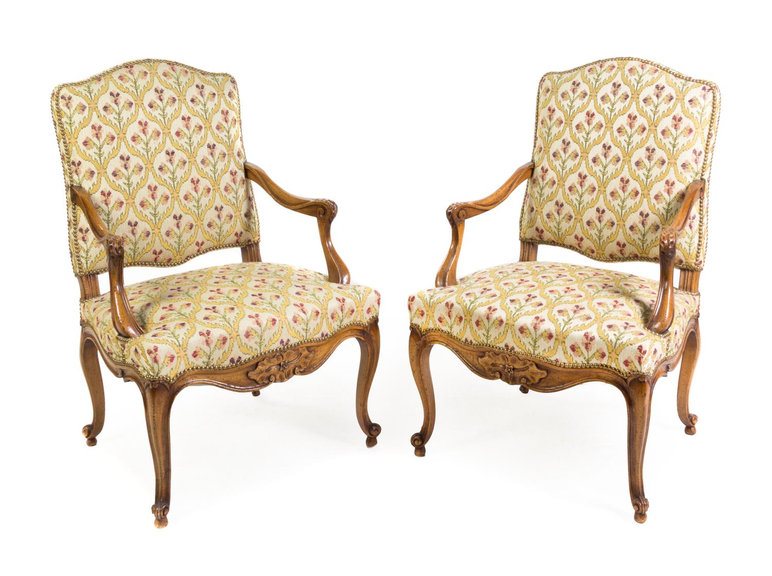 A Pair of Louis XV Style Walnut Fauteuils Height 40 1/2 x width 26 x depth 21 1/2 inches. — LATE 19TH CENTURY