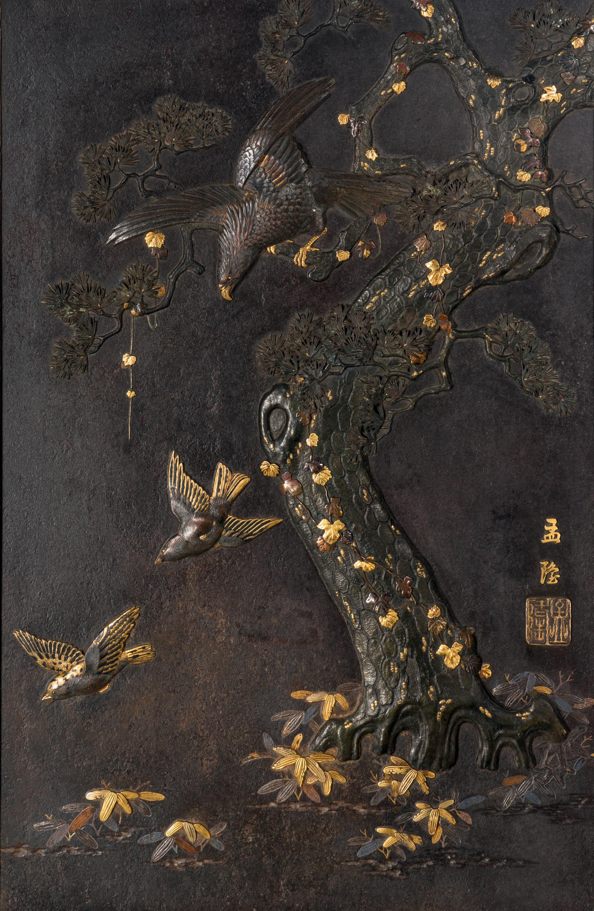 A Japanese Parcel Gilt and Mixed-Metal Inlaid Iron 'Eagle and Pine' Plaque, Meiji Period 日本明治時期 鐵花鳥挂屏