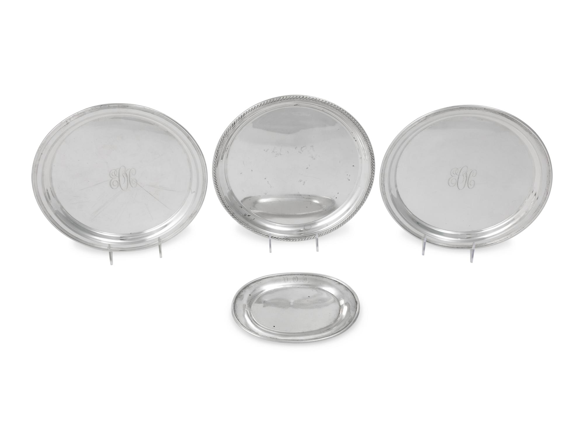 A Group of Four American Silver Platters