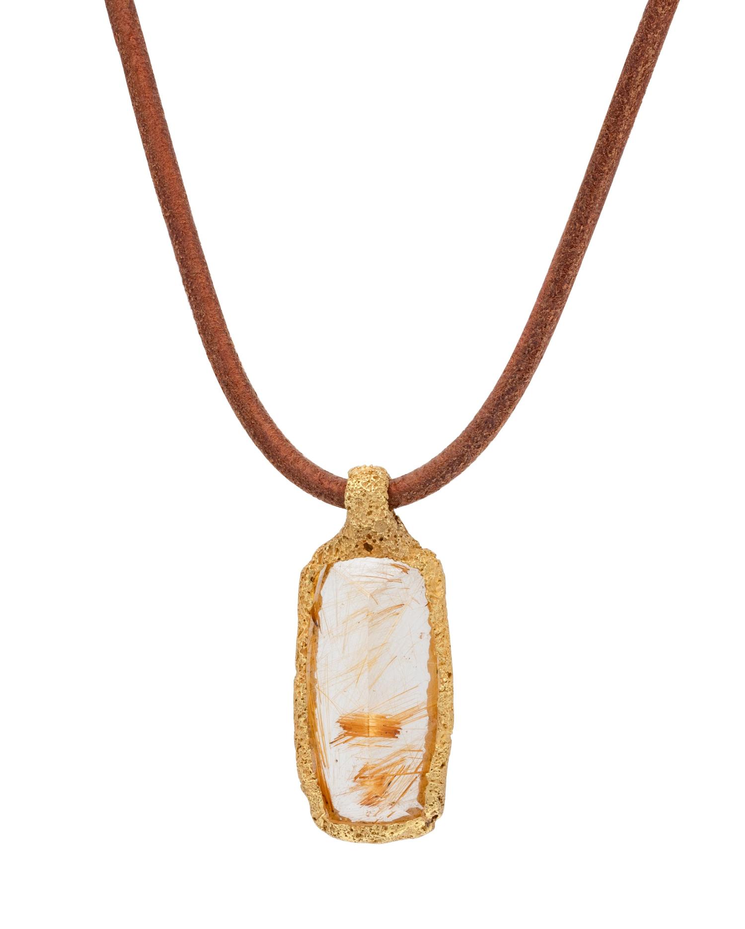 A Yellow Gold and Rutilated Quartz Pendant/Necklace,