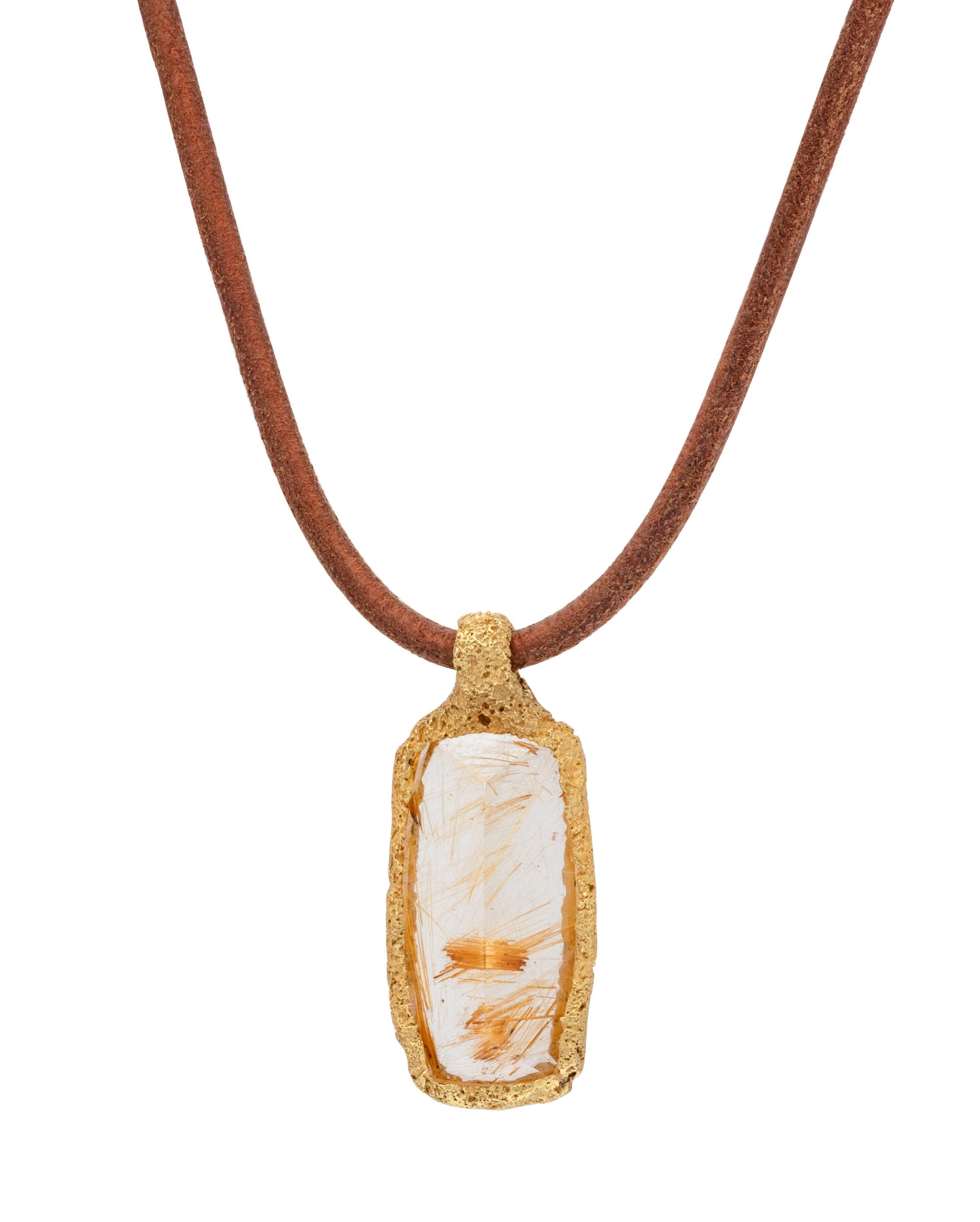 A Yellow Gold and Rutilated Quartz Pendant/Necklace,
