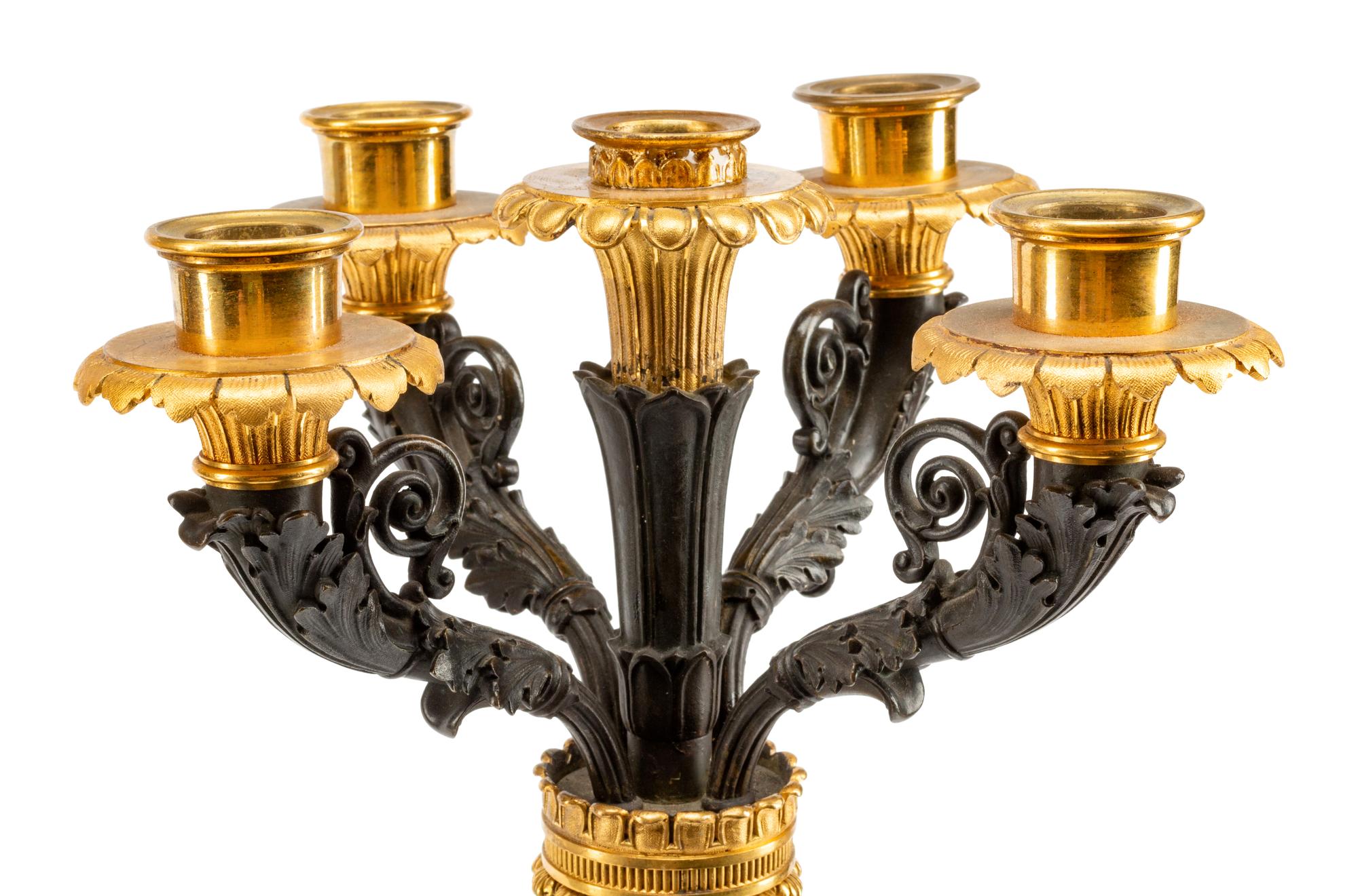A Pair of Empire Style Gilt and Patinated Bronze and Marble Five-Light Candelabra