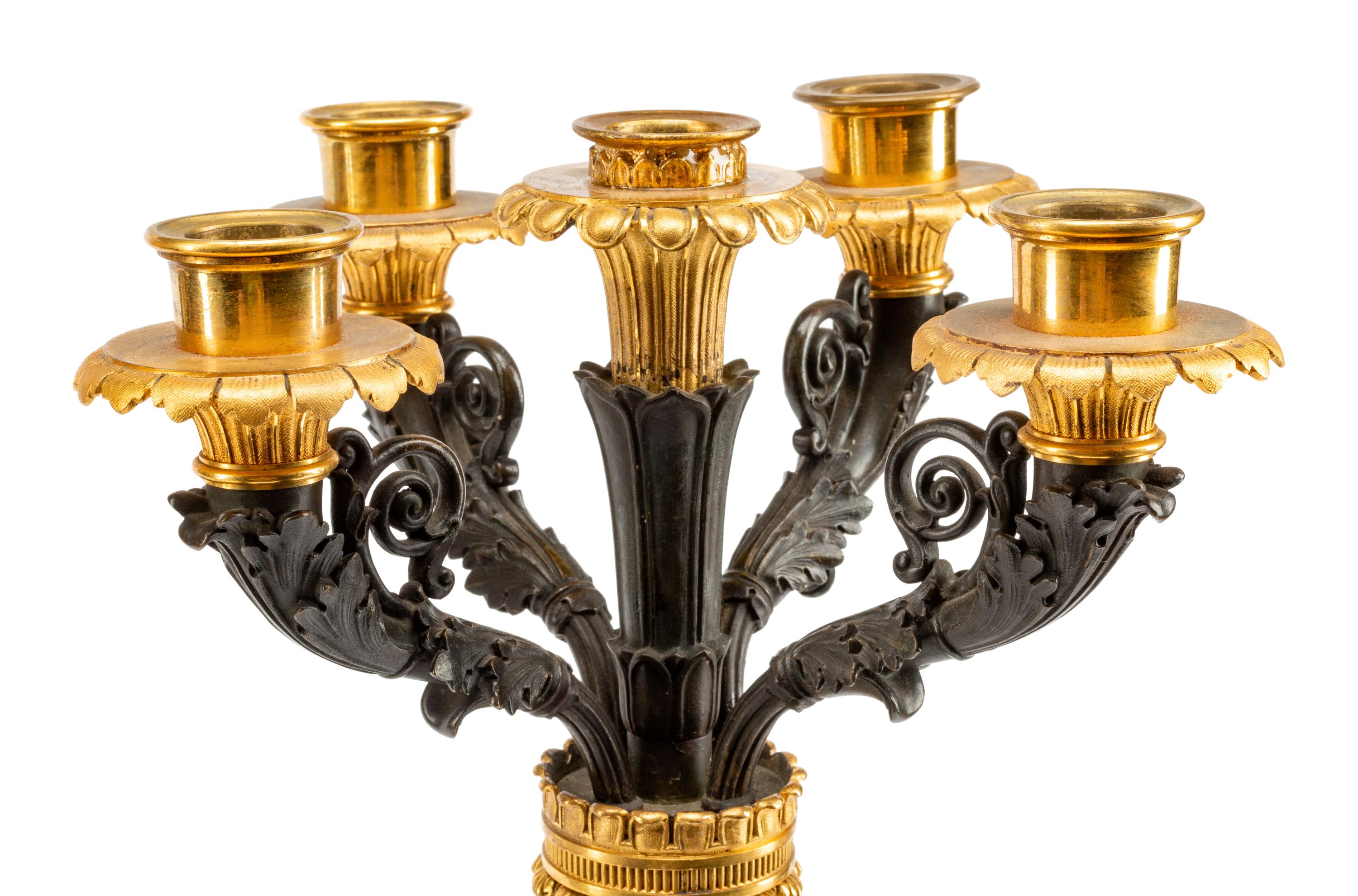 A Pair of Empire Style Gilt and Patinated Bronze and Marble Five-Light Candelabra