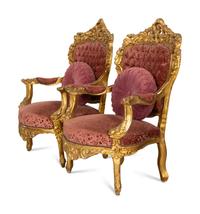 A Pair of Italian Rococo Style Giltwood Armchairs