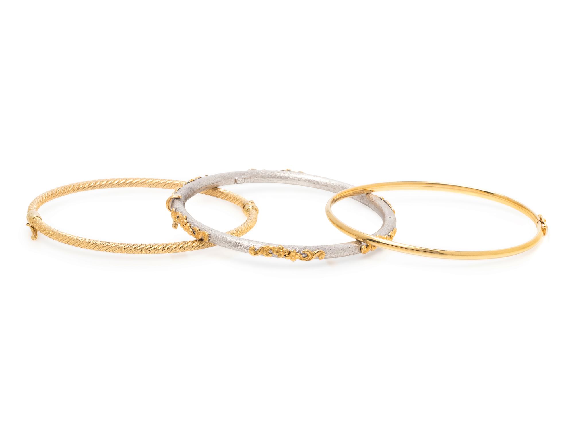 COLLECTION OF GOLD BANGLE BRACELETS