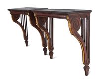 A Pair of Continental Parcel Gilt Walnut Console Tables
