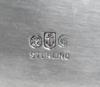 An American Silver Covered Dish, Gorham Mfg. Co., Providence, RI, Circa 1915, the cover with an urn form finial, the body with twin put