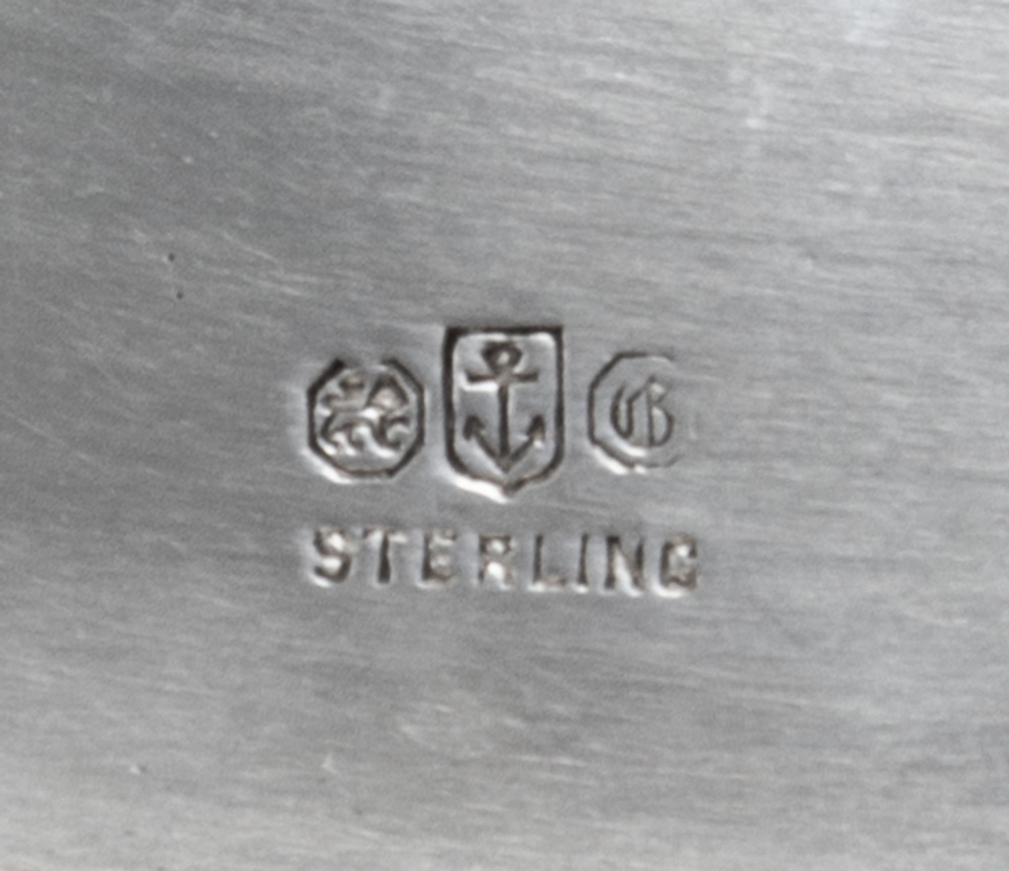 An American Silver Covered Dish, Gorham Mfg. Co., Providence, RI, Circa 1915, the cover with an urn form finial, the body with twin put