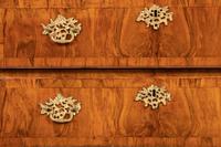 A German Gilt Bronze Mounted and Parcel Gilt Burl Walnut Bombe Chest in the Louis XV Taste