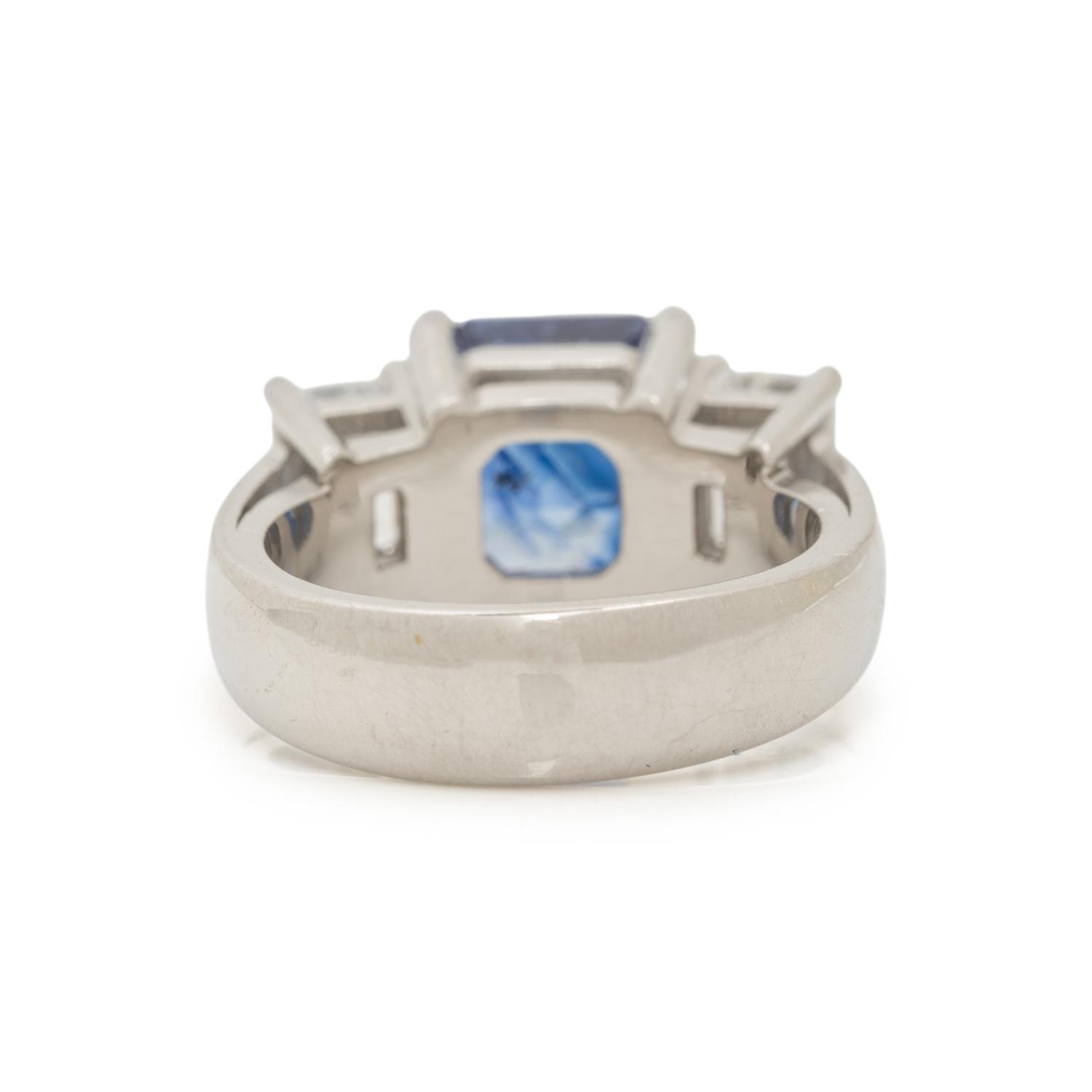 PLATINUM, SAPPHIRE, AND DIAMOND RING