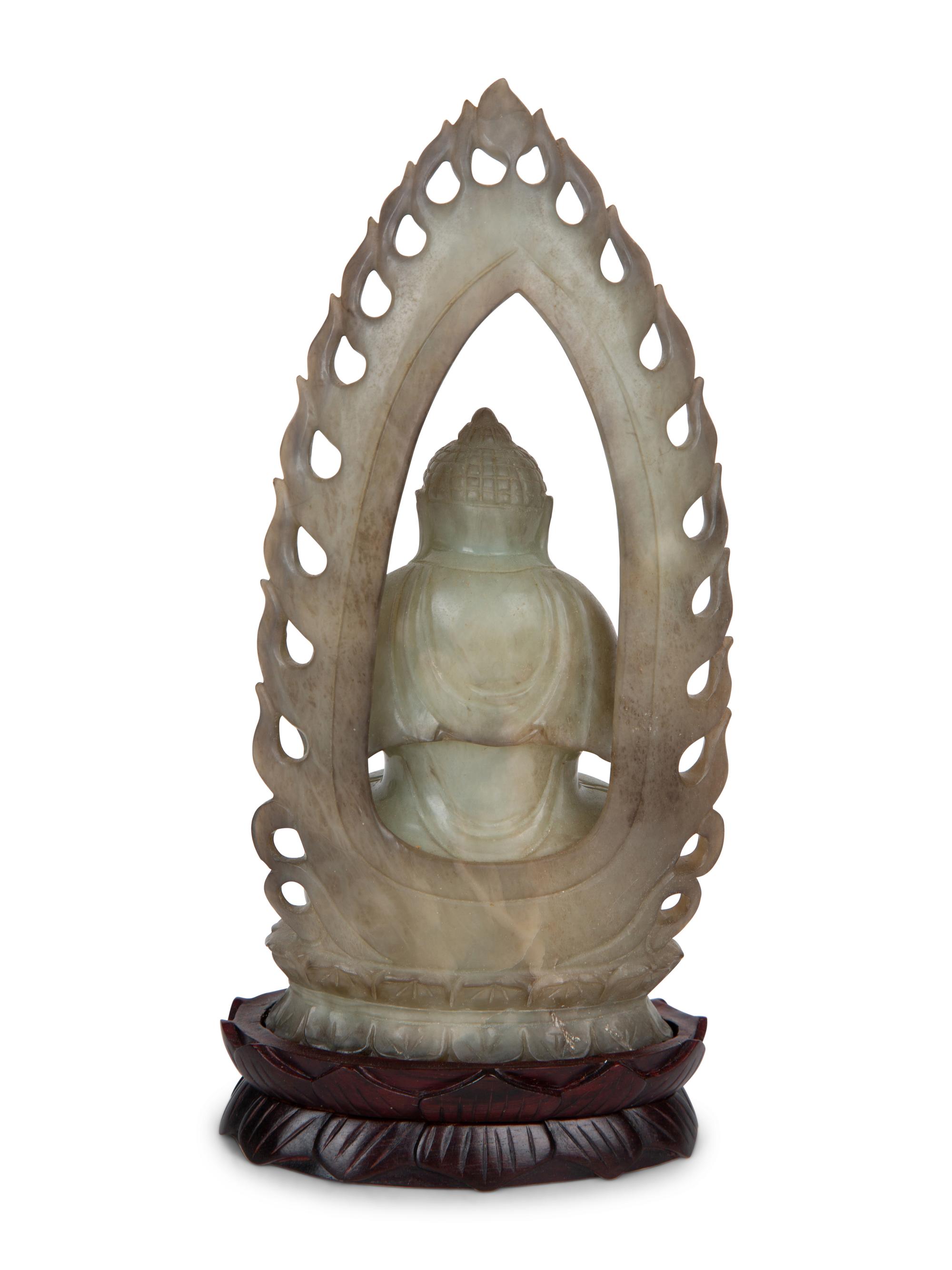 A Chinese Carved White Jade Seated Buddha Under Halo — 20TH CENTURY