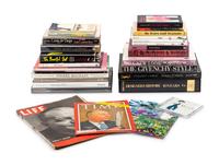 Group Thirty-Two Fashion Reference Books Relating to Christian Dior and Yves Saint Laurent
