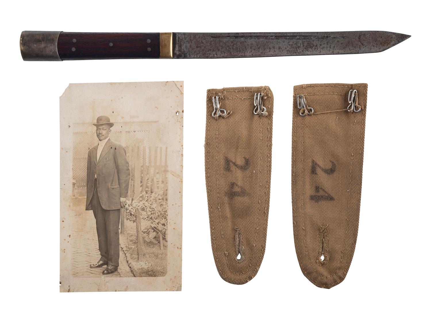 [BUFFALO SOLDIERS] -- [SPANISH AMERICAN WAR]. Sergeant Major George D. Powell, Co. C, 24th US Infantry, archive incl. Buffalo Soldiers' parade flag, identified wooden box and personal items.